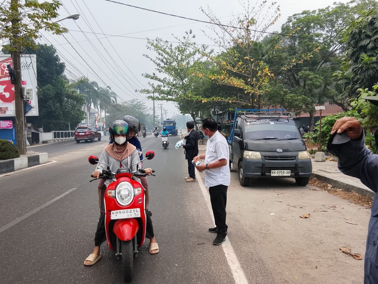 GABUNGAN ORGANISASI PERS DAN LSM BAGIKAN 5.000 MASKER
